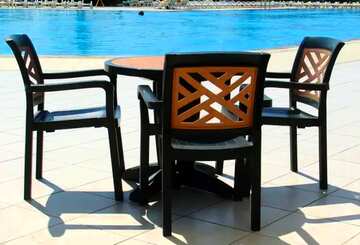 FX №2703 Cover. Table and chairs by the pool.